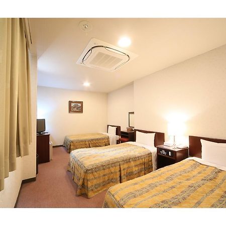 City Hotel Ikeda Okayama Bagian luar foto