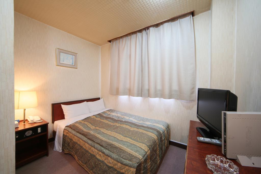 City Hotel Ikeda Okayama Bagian luar foto