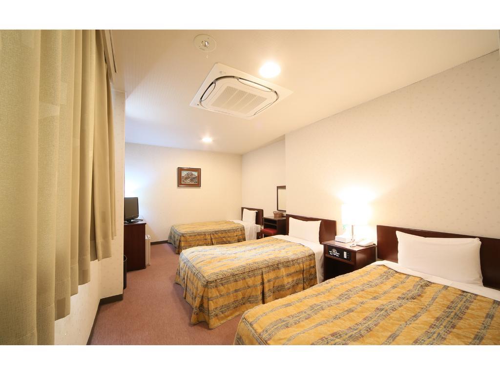 City Hotel Ikeda Okayama Bagian luar foto