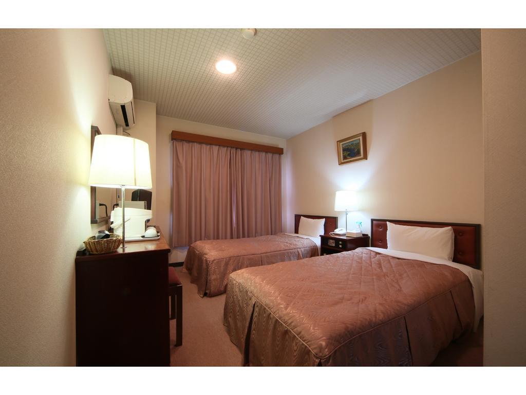 City Hotel Ikeda Okayama Bagian luar foto